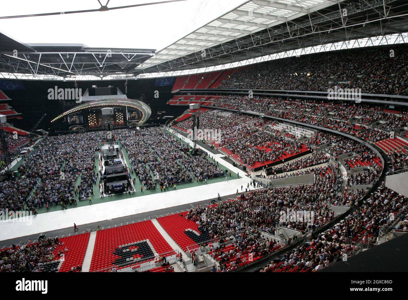 Concert goers enjoy the Concert for Diana at Wembley Stadium in London. Stock Photo