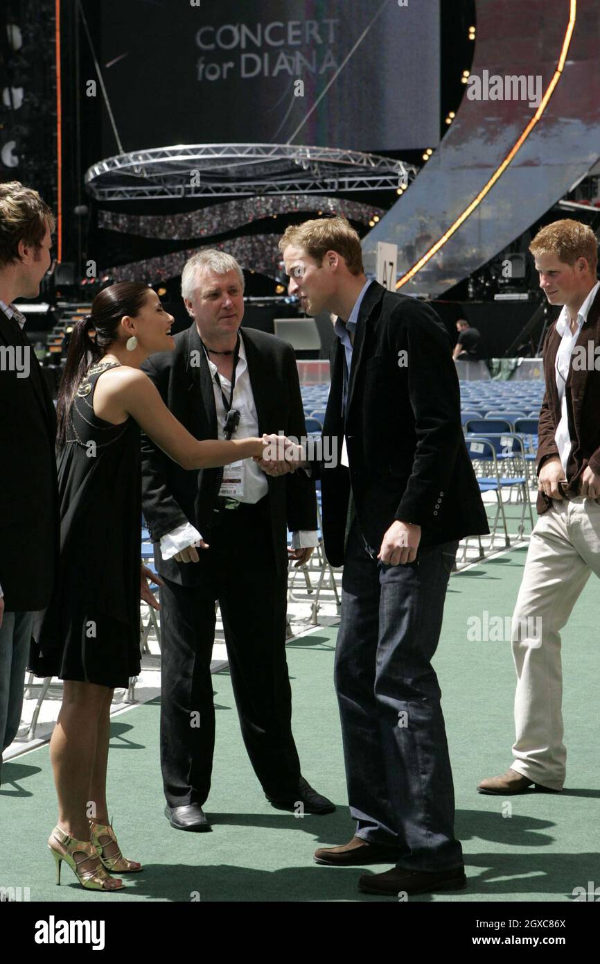 Prince William and Prince Harry meet Nelly Furtado at Wembley Stadium at the Concert for Diana in London. Stock Photo