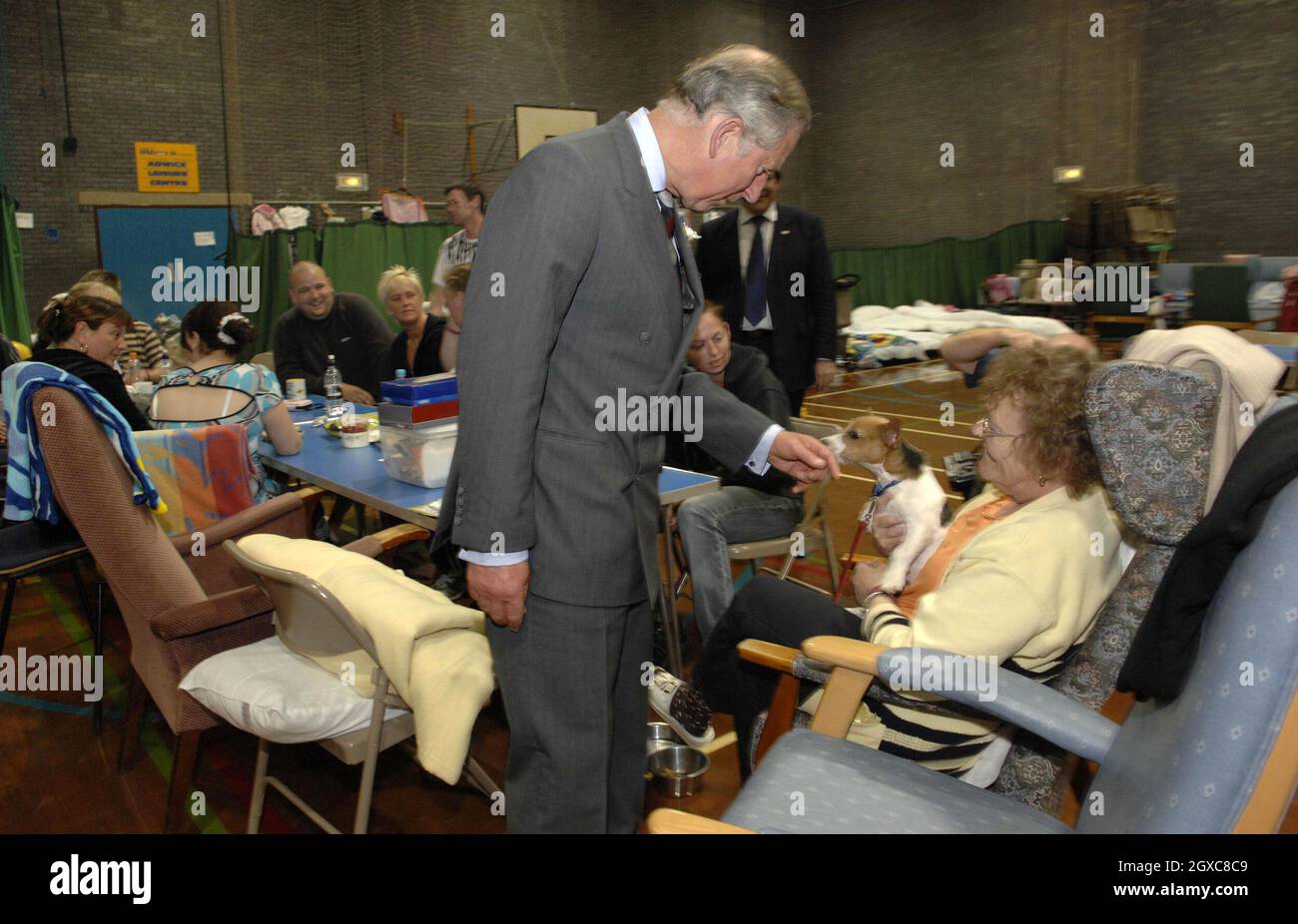 Prince Charles, Prince of Wales visits flood victims in the sports
