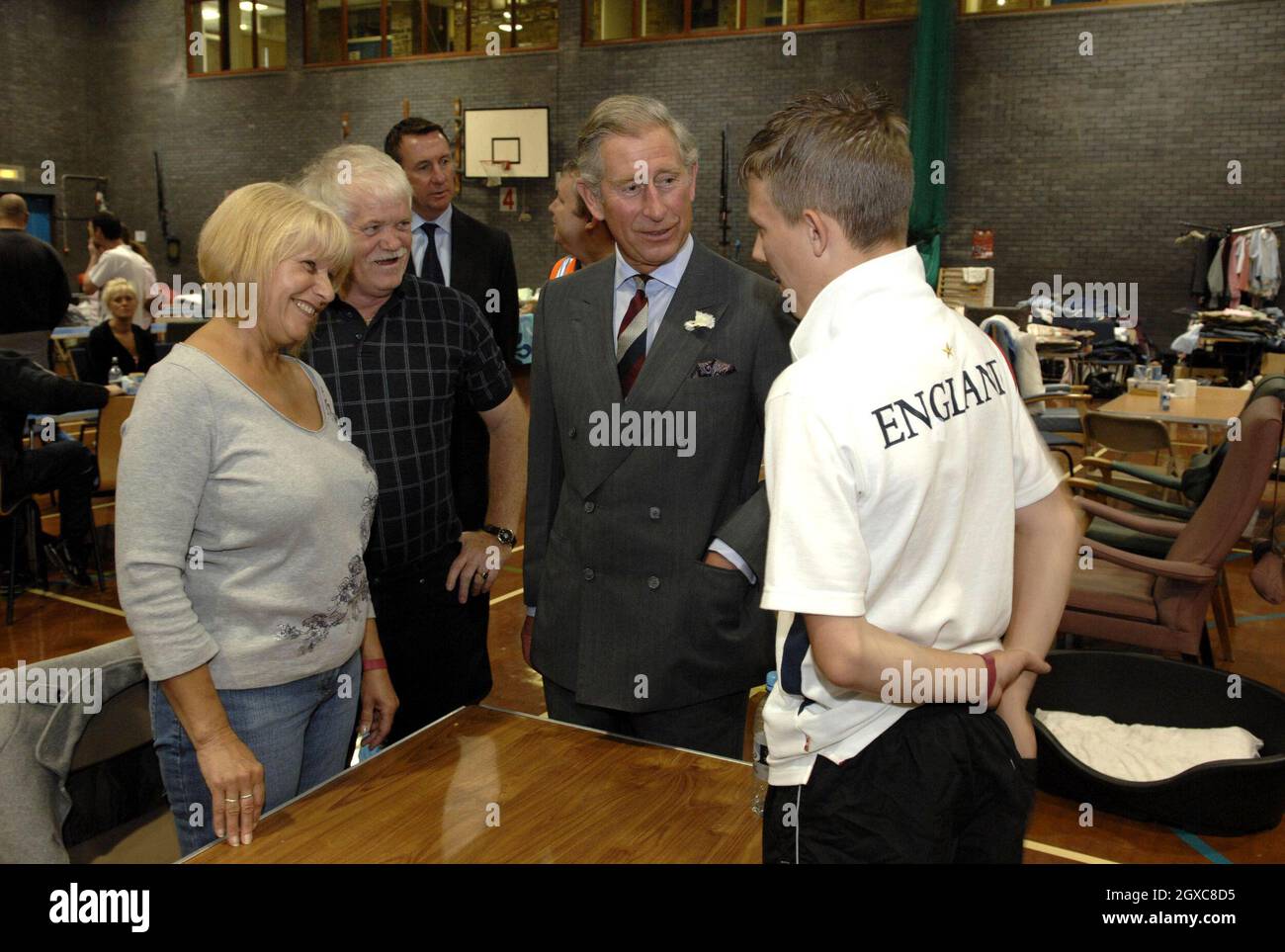 Prince Charles, Prince of Wales visits flood victims in the sports