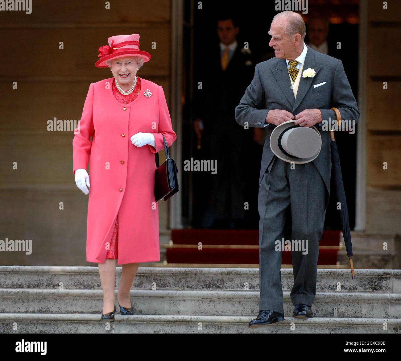 Queen Elizabeth ll and Prince Philip, Duke of Edinburgh arrive at a