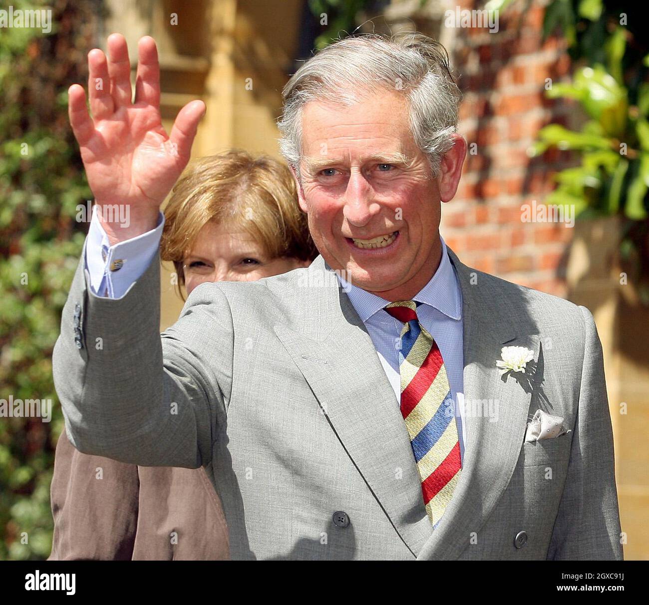 Prince Charles, Prince of Wales waves as he leaves Barrington Court in Barrington. Stock Photo
