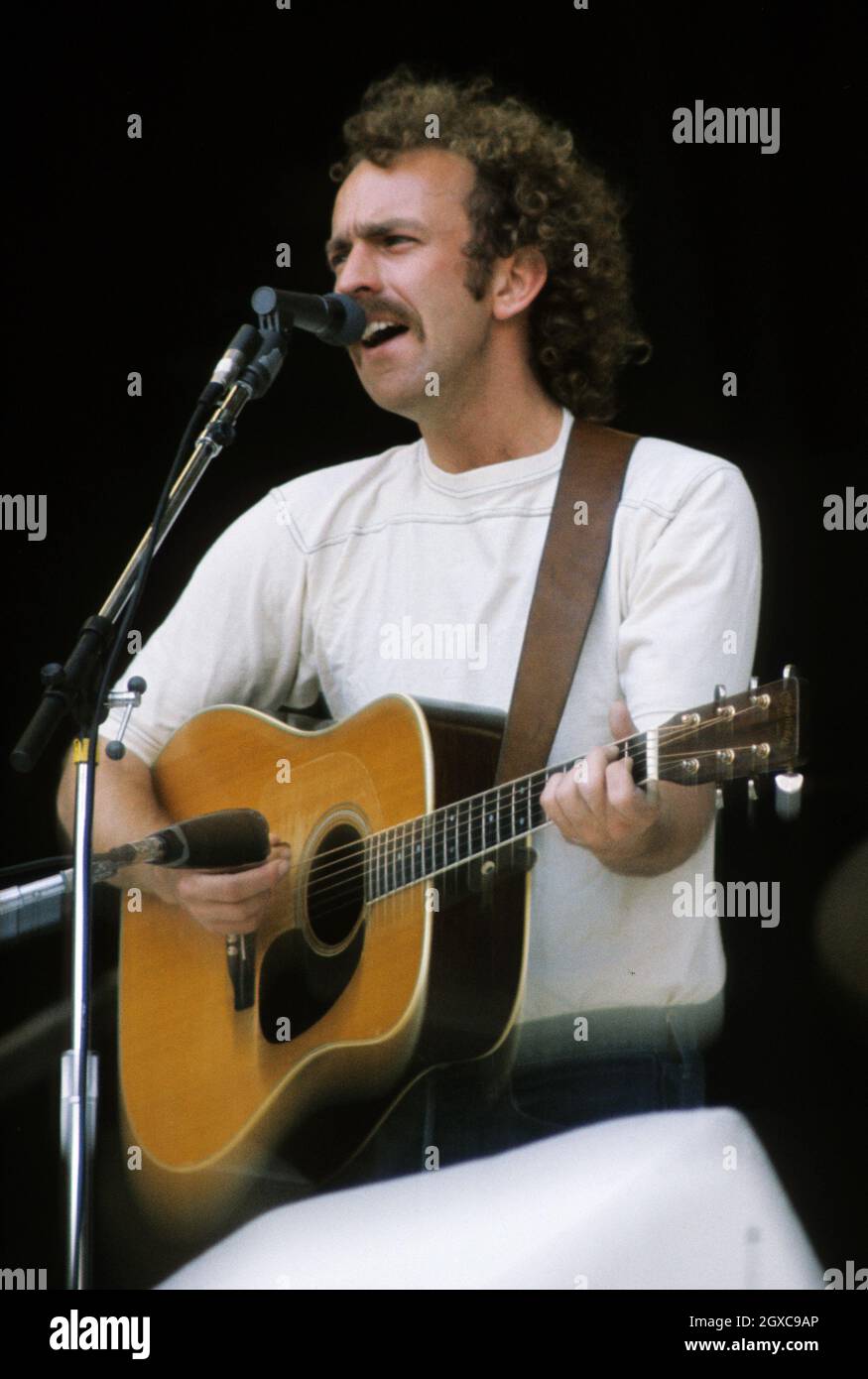 Eagles guitarist Bernie Leadon performing on stage, circa 1975 Stock