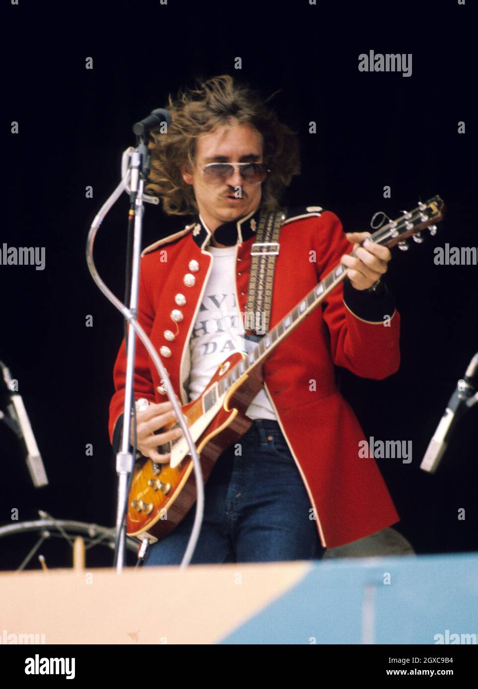 Eagles guitarist Joe Walsh performing on stage, circa 1975 Stock Photo