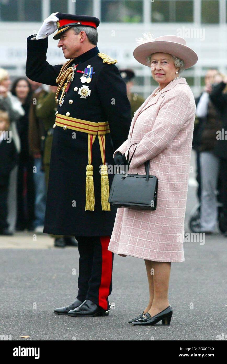 Queen Elizabeth II stands with Chief Royal Engineer Sir Kevin Donoghue during a visit to the Corps of Royal Engineers at Brompton Barracks in Chatham, Kent. Stock Photo