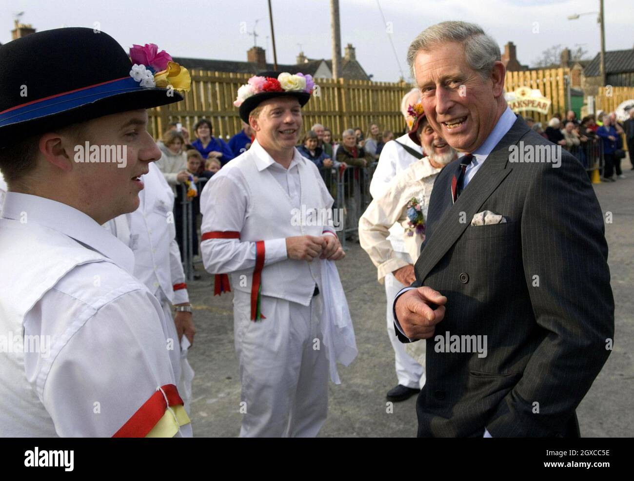 Prince Charles, Prince of Wales talks to Morris dancers during a visit to Wychwood Brewery, in Witney, Oxon, to see the brewing and fermentation processes of Duchy Ale. Stock Photo
