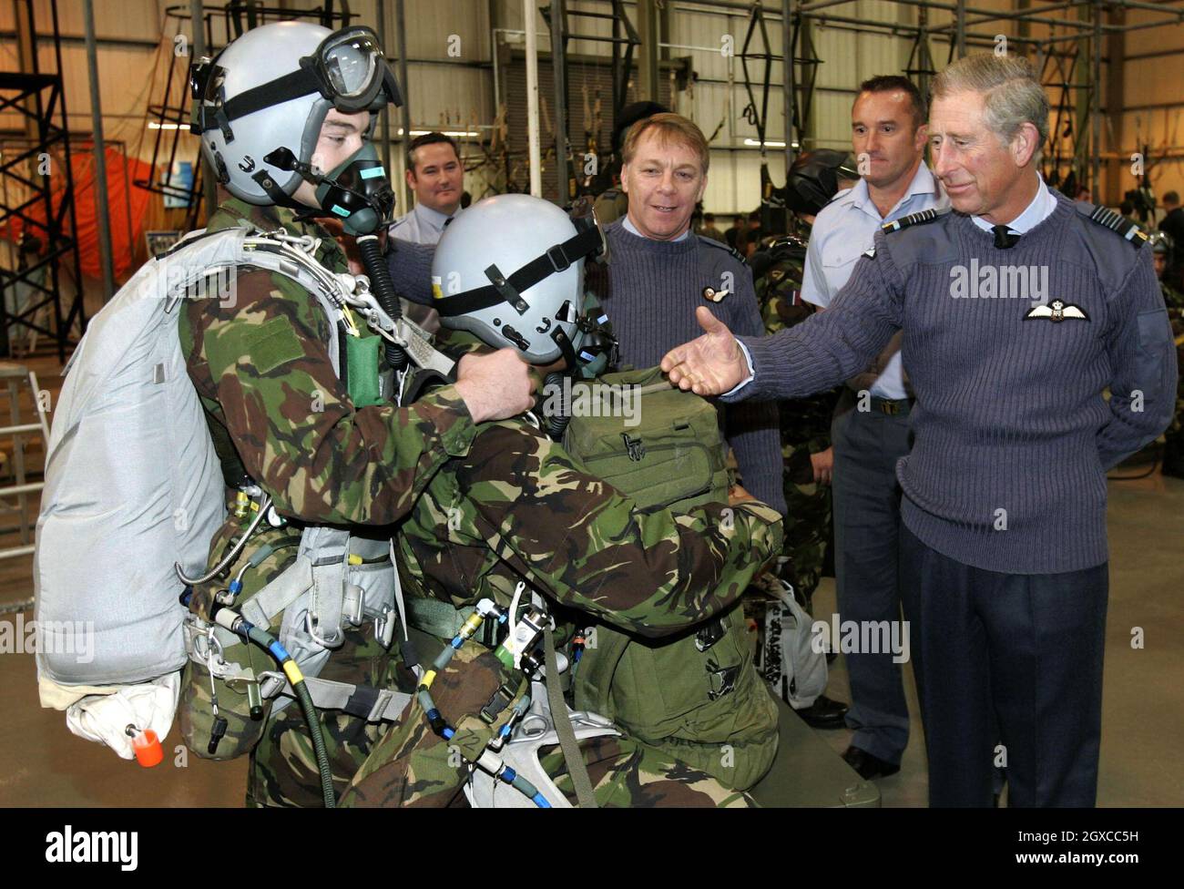 Prince Charles, Prince of Wales watches a demonstration and meets parachutists during a visit to RAF Brize Norton. The Prince returned to the Royal Air Force's Parachute Training School at the Brize Norton base in Oxfordshire for the first time since 1978. Stock Photo