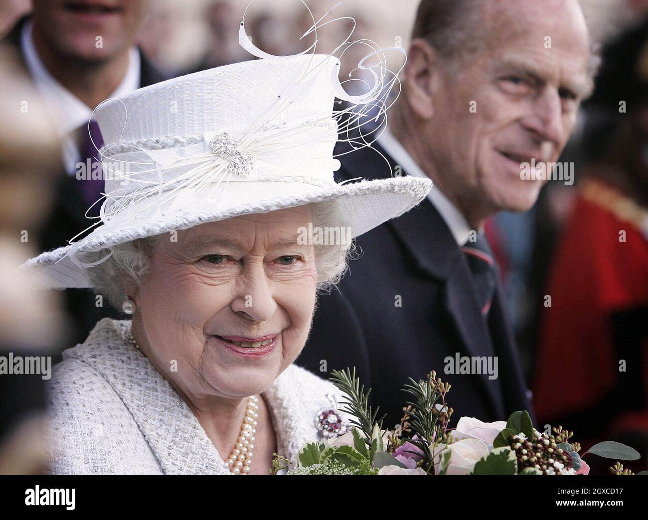 Queen Elizabeth ll and Prince Philip, Duke of Edinburgh attend the unveiling of the Jubilee Walkway panel on Parliament Square following a service of celebration for their diamond wedding anniversary at Westminster Abbey in London. Stock Photo