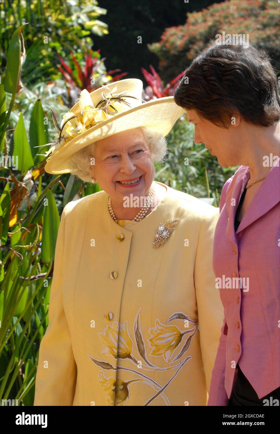 Queen Elizabeth walks with the new Prime Minister of New Zealand, Helen Clark, following the opening of the Commonwealth Heads of Government Conference in Kampala, Uganda Stock Photo