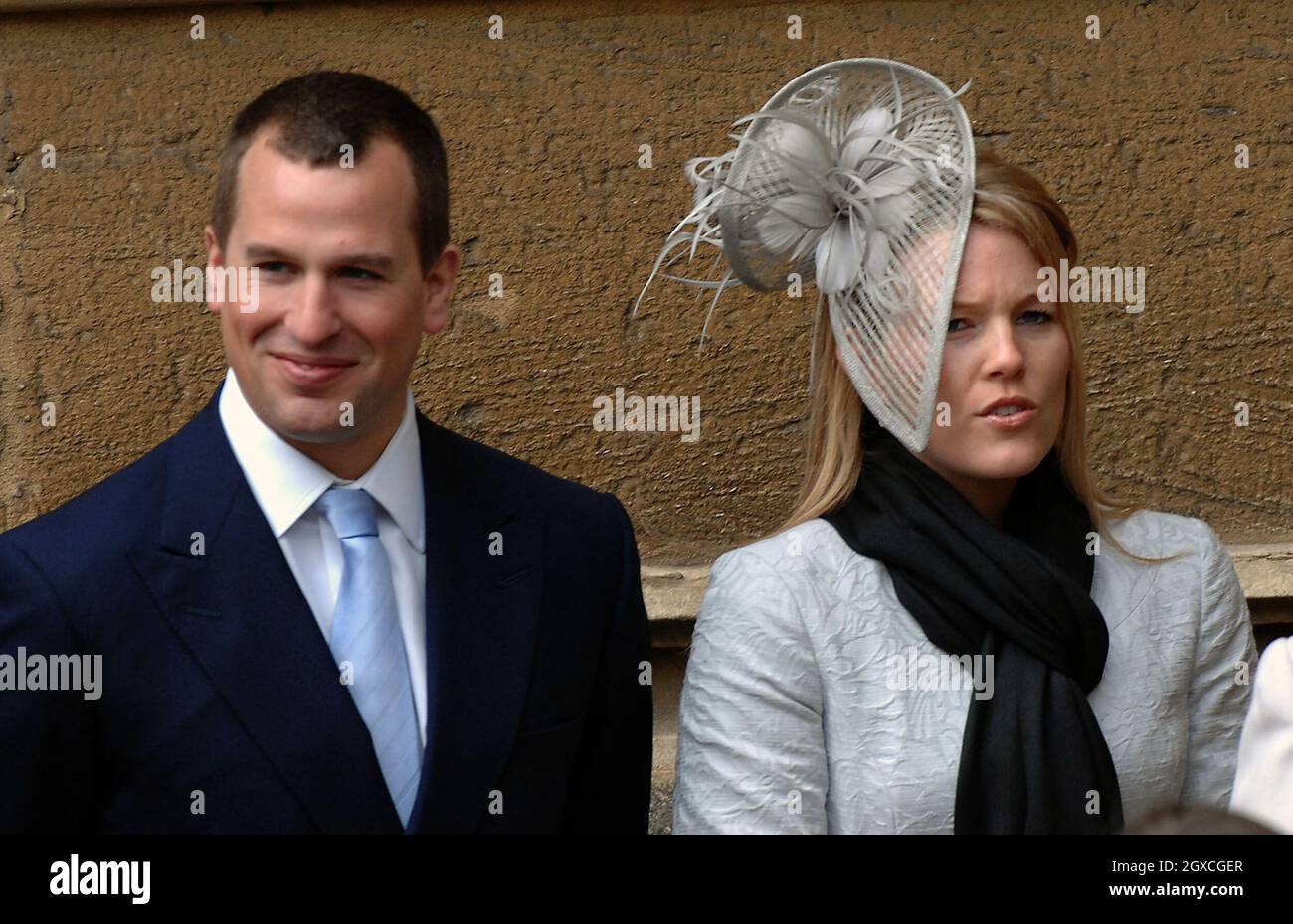 Peter Phillips and fiancee Autumn Kelly leave St. George's Chapel at Windsor Castle following the Easter Day Service. Stock Photo