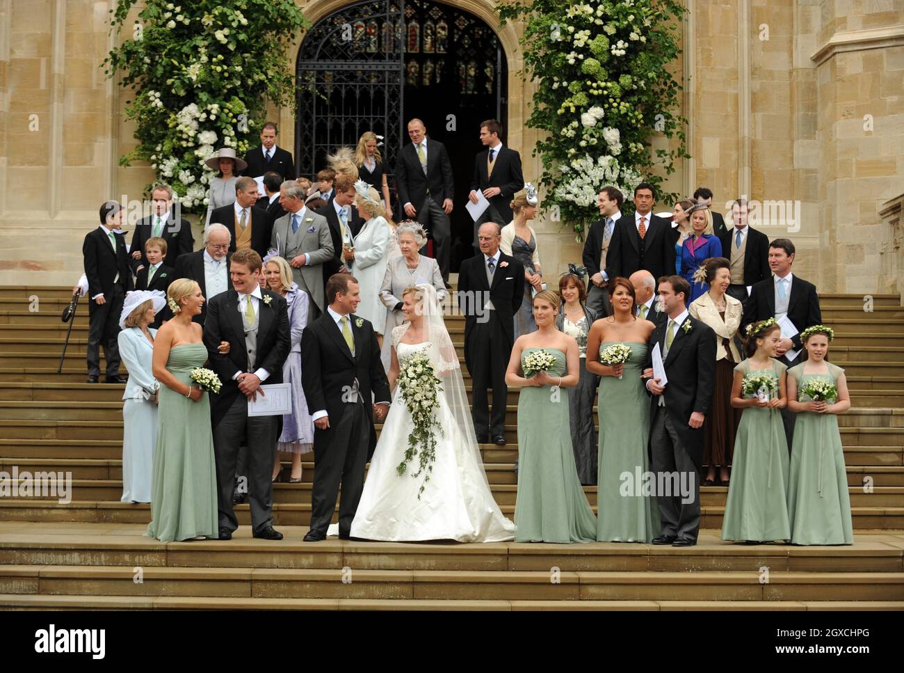 Peter Phillips and Autumn Kelly leave St. George's Chapel after their marriage ceremony at Windor Castle, Windsor. Stock Photo