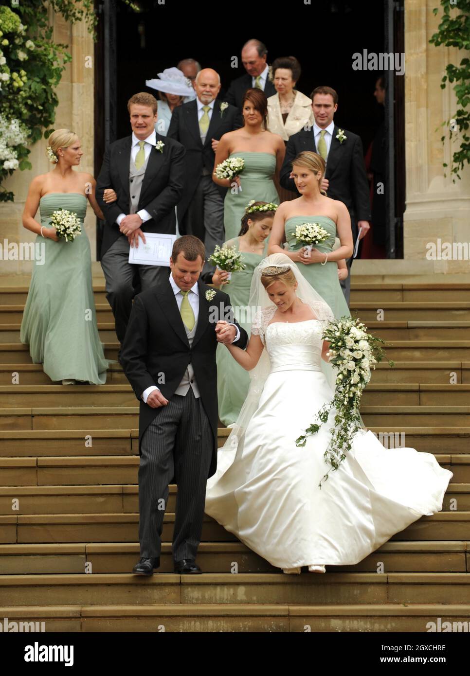 Peter Phillips and Autumn Kelly leave St. George's Chapel after their marriage ceremony at Windor Castle, Windsor. Stock Photo