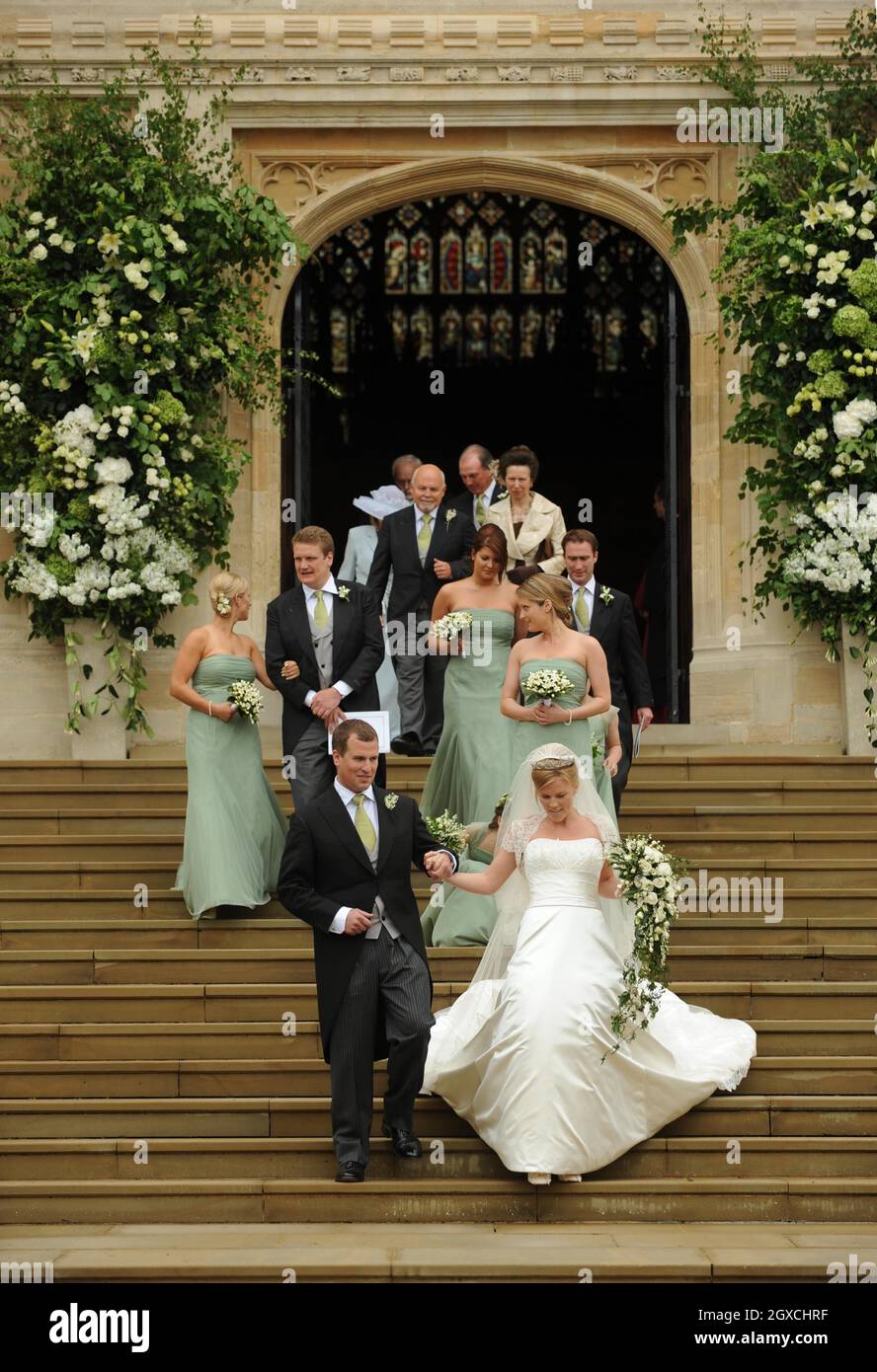 Peter Phillips and Autumn Kelly leave St. George's Chapel after their marriage ceremony at Windor Castle, Windsor. Stock Photo