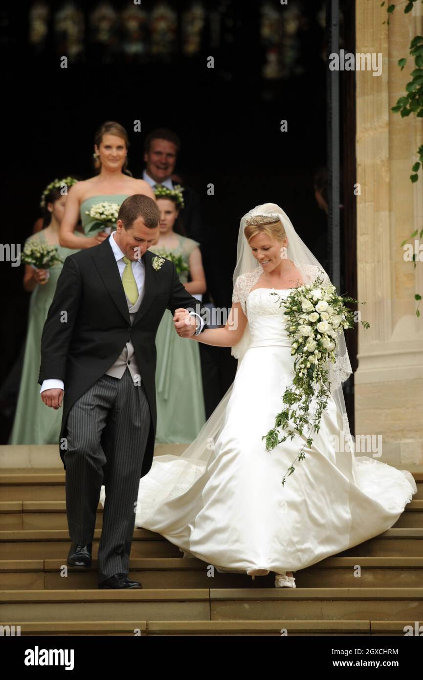 Peter Phillips and Autumn Kelly leave St. George's Chapel after their marriage ceremony at Windor Castle, Windsor. Stock Photo
