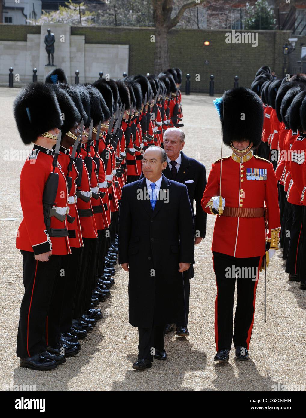 President Felipe Calderon of Mexico, accompanied by Prince Philip, Duke of Edinburgh, reviews a Guard of Honour at the start of a State Visit to Britain. Stock Photo