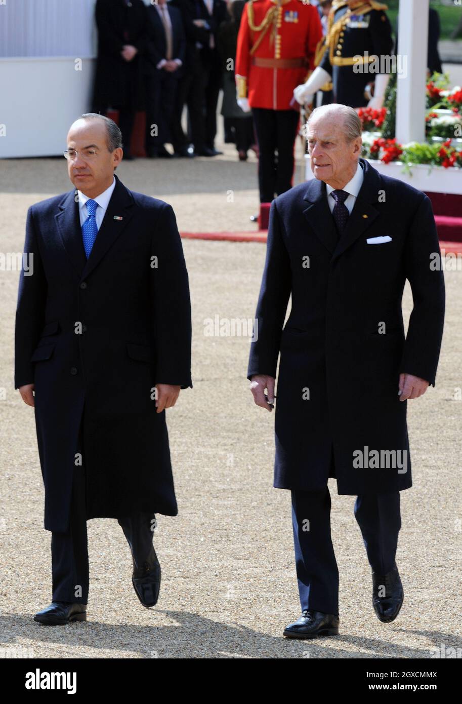 President Felipe Calderon of Mexico, accompanied by Prince Philip, Duke of Edinburgh, reviews a Guard of Honour at the start of a State Visit to Britain. Stock Photo