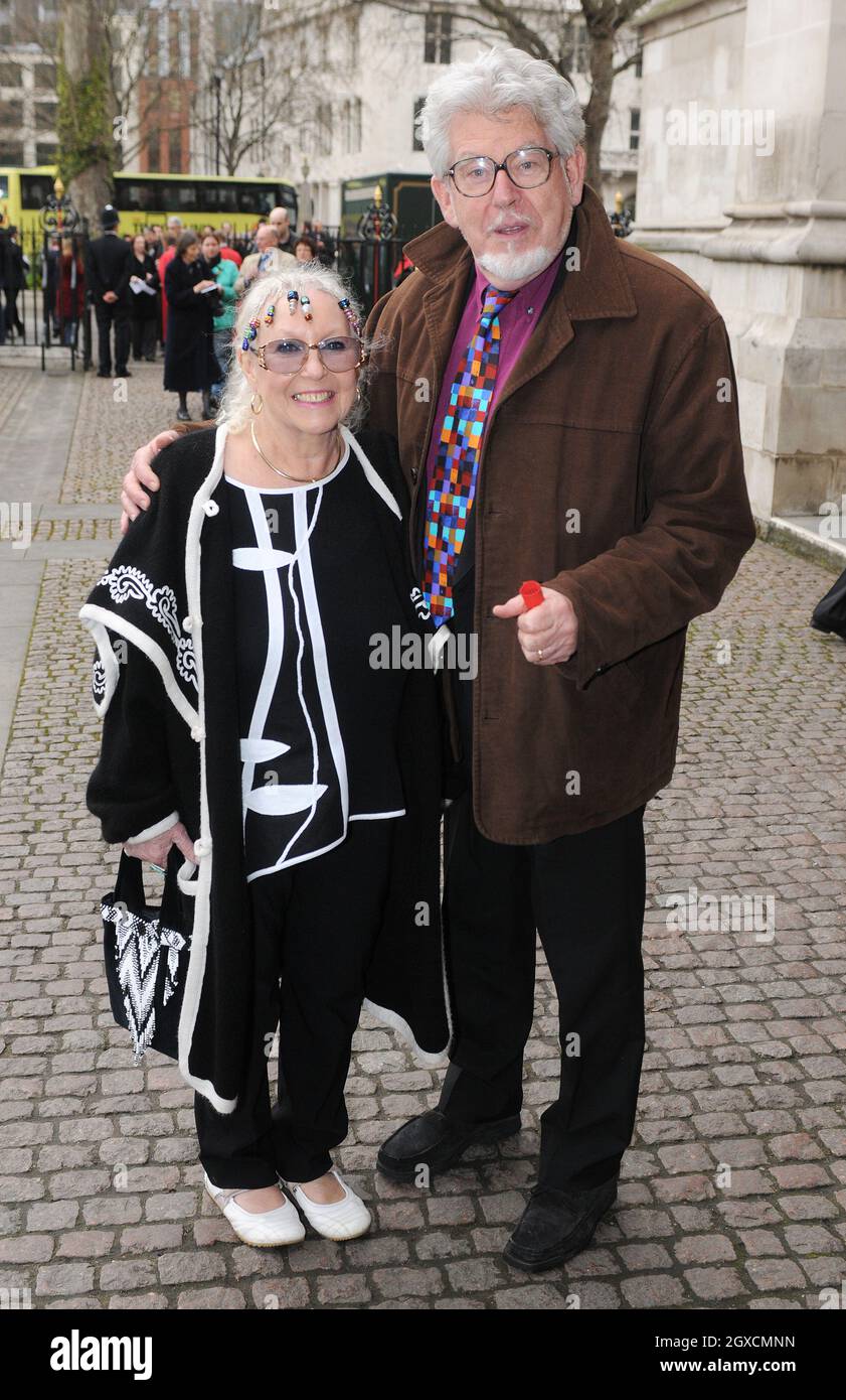 Rolf Harris and wife Alwen Hughes arrive for a memorial service for the