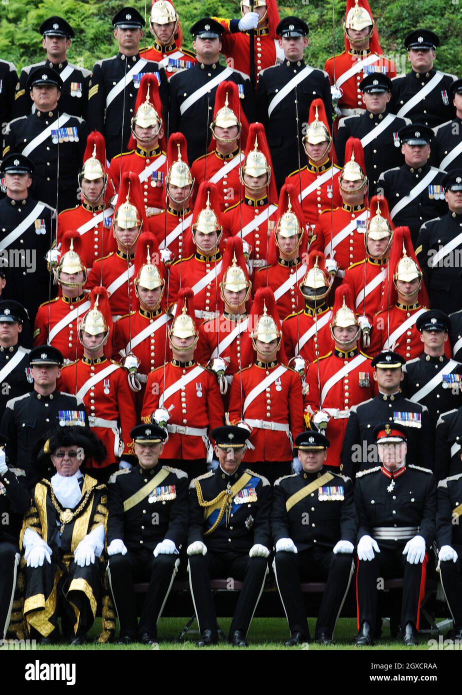 Prince Charles, Prince of Wales, Colonel in Chief, takes part in an official Regimental photo when he visits 1st The Queen's Dragoon Guards to celebrate their 50th anniversary and to take the salute as they exercise their Freedom of the City of Cardiff at Cardiff Castle on July 31, 2009. Stock Photo