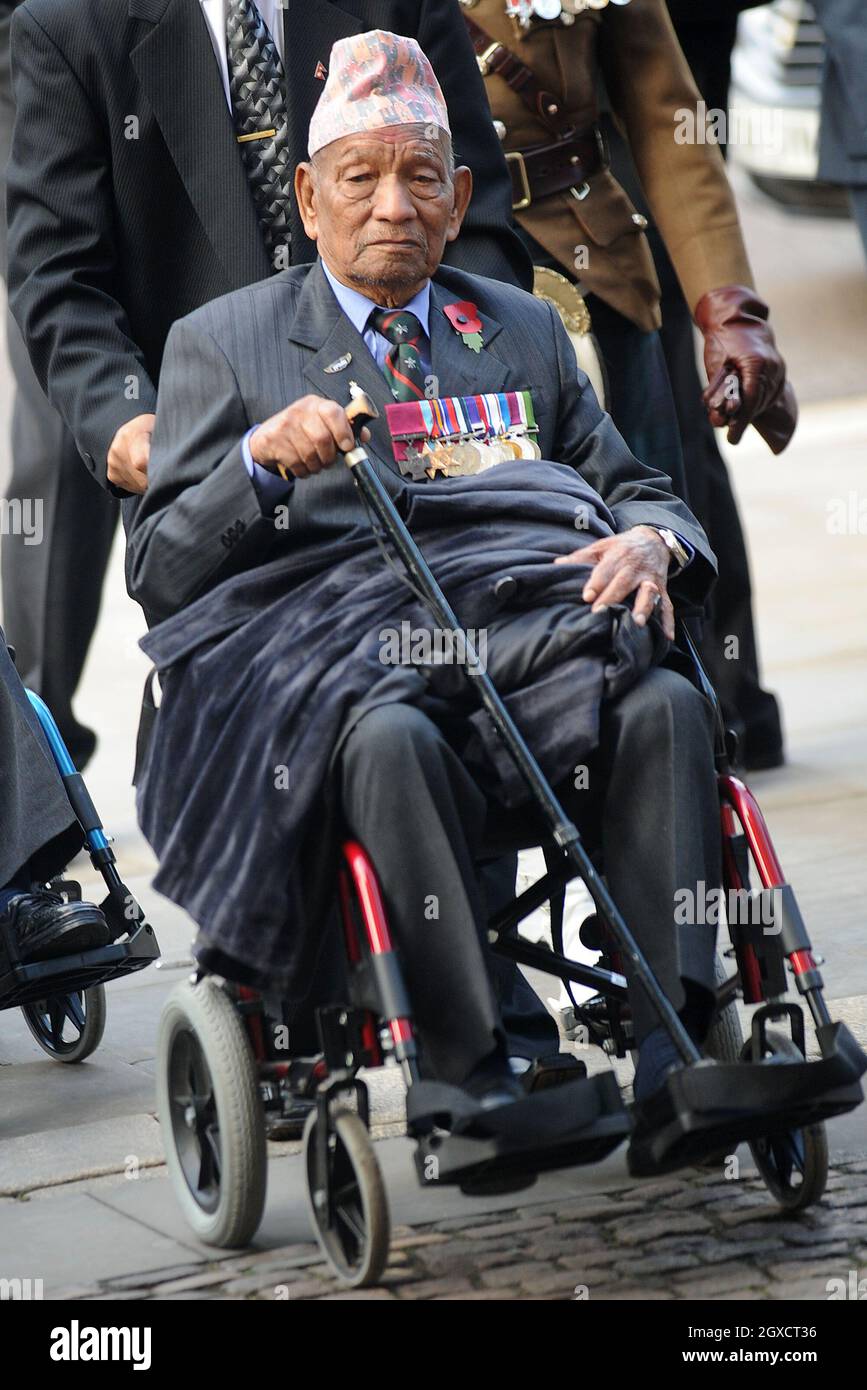 Gurkha Victoria Cross holder Bahadur Pun arrives for a special service commemorating the passing of the generation of combatants from World War I at Westminster Abbey on November 11, 2009 in London, England. Stock Photo