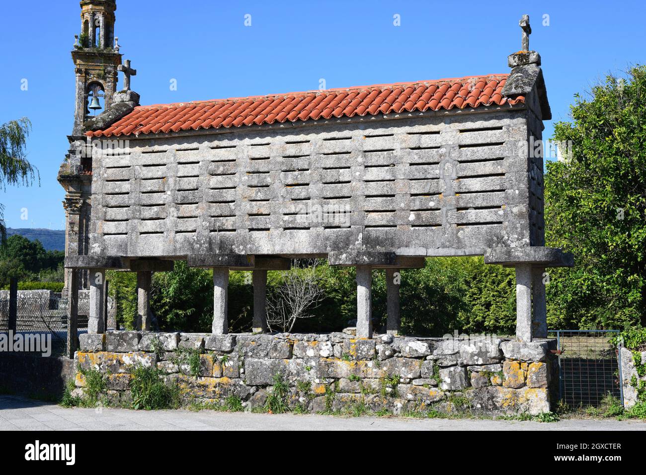 Traditional granary (horreo) of granite stone. Carnota, A Coruna, Galicia, Spain. Stock Photo