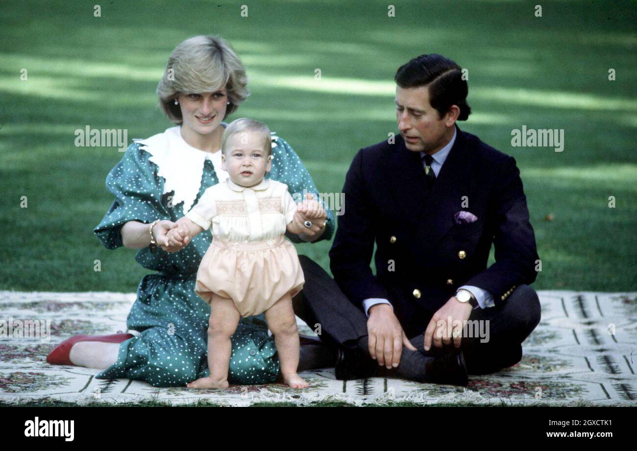 Prince William is seen with his parents HRH Prince Charles and the late Princess Diana (wearing Vanvelden puritan collar) during their 1983 official visit to New Zealand, in April 1983 in Auckland, New Zealand. Stock Photo