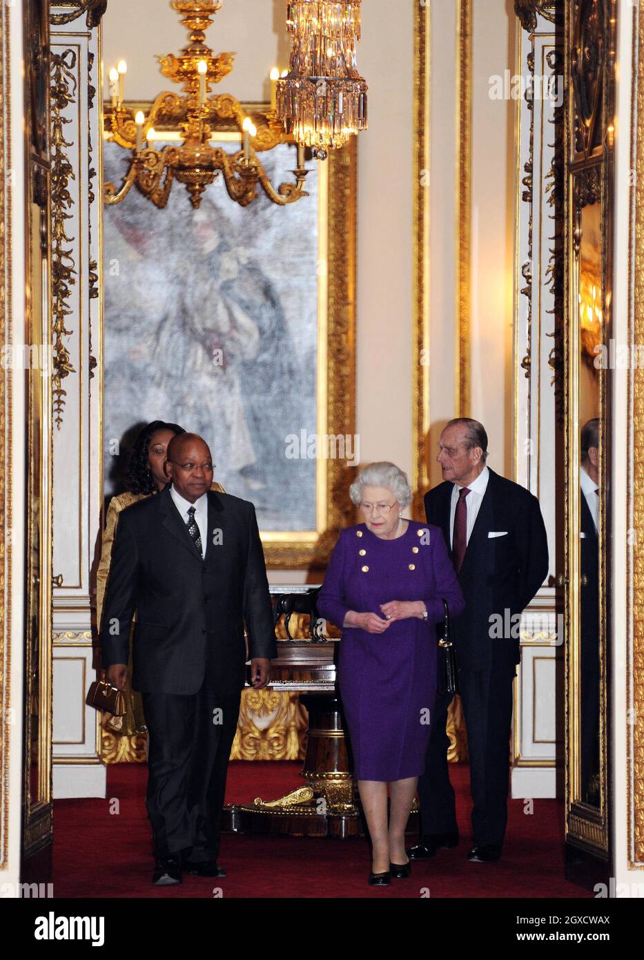 Britain's Queen Elizabeth II, Prince Philip, Duke of Edinburgh, President of South Africa Jacob Zuma and Mrs Zuma visit an exhibition of South African related items at Buckingham Palace in London as part of the President's three-day state visit. Stock Photo