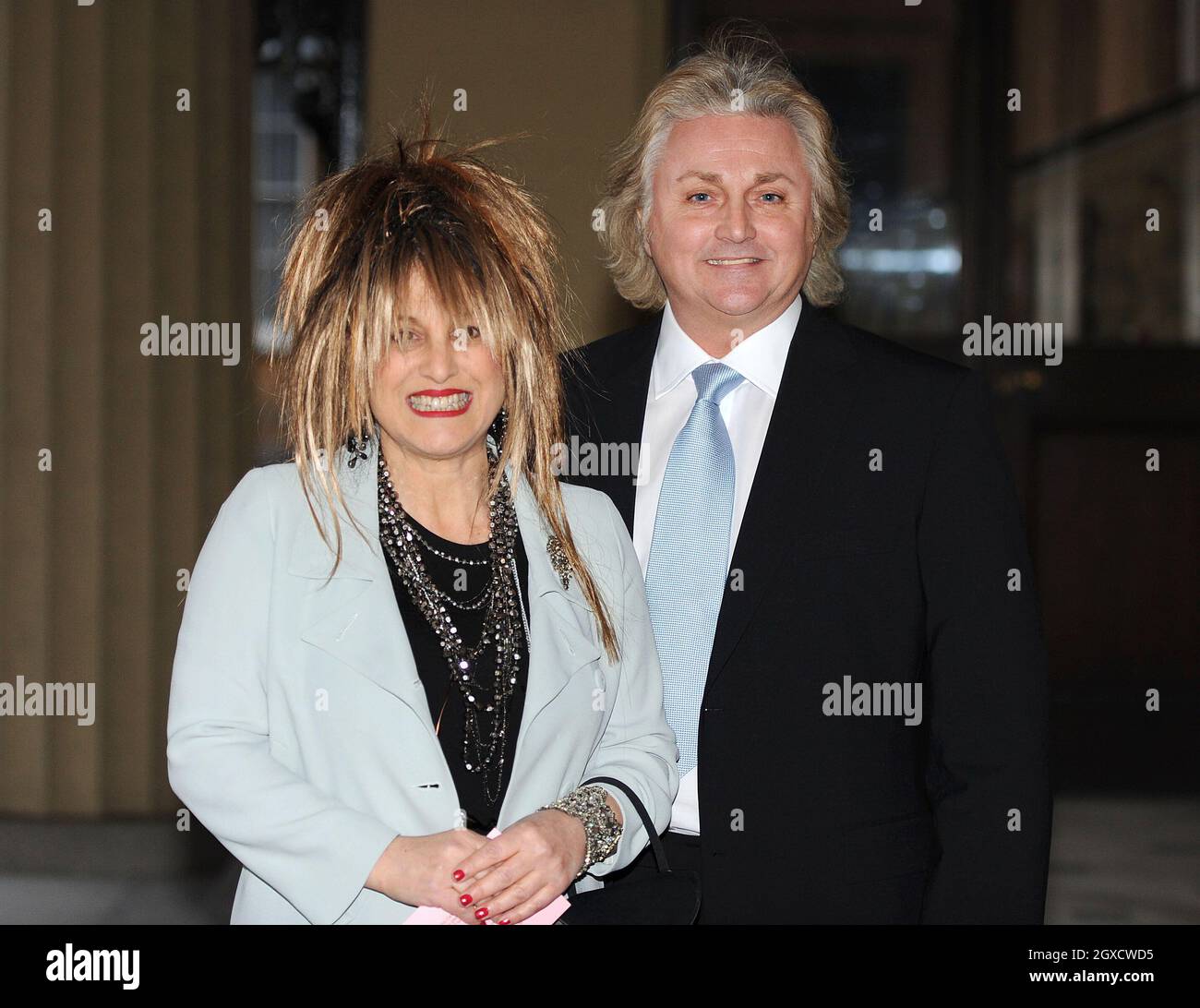 Fashion designers Elizabeth and David Emanuel arrive for a reception for the British Clothing Industry at Buckingham Palace on March 16, 2010. Stock Photo