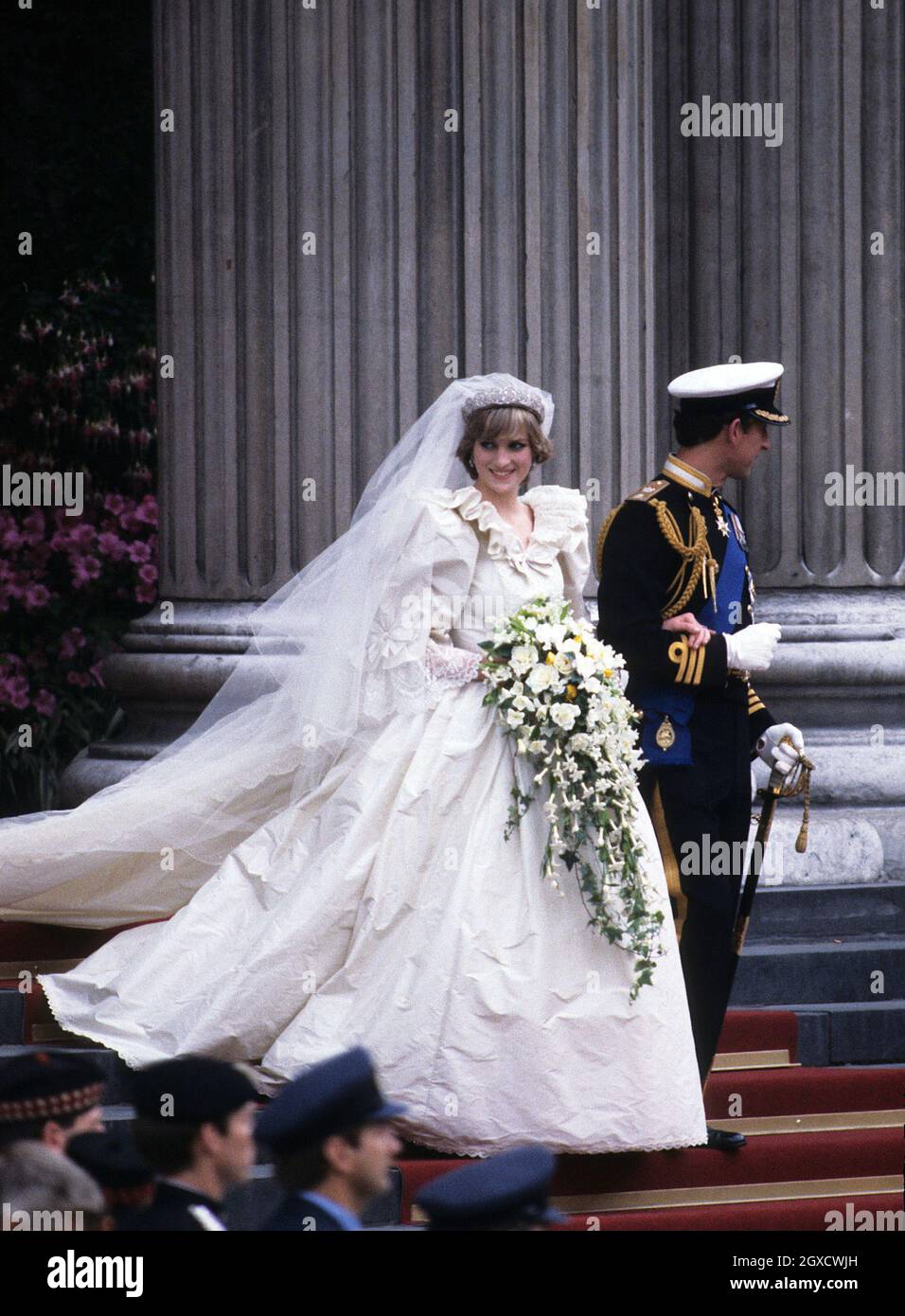 Diana, Princess of Wales, wearing an Emanuel wedding dress, and Prince Charles, Prince of Wales leave St. Paul's Cathedral following their wedding on 29 July 1981.  Designers Elizabeth and David Emanuel are holding an auction of dresses worn by the late Princess Diana. The dresses are to go up for auction on June 8, 2010 in London, at specialist vintage fashion auctioneers Kerry Taylor Auctions. Stock Photo
