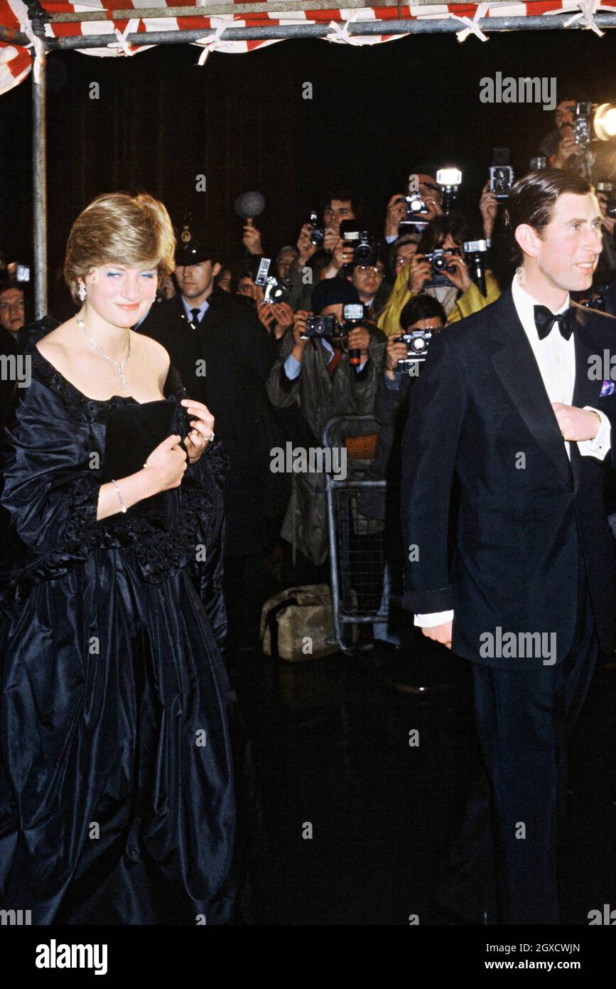 **FILE PHOTO** Lady Diana Spencer, later to become Diana, Princess of Wales, sets the flashbulbs popping as she wears a revealing Emanuel black dress attending her first official engagement with Prince Charles at a fundraising concert at the Goldsmiths Hall in London in March 1981. Designers Elizabeth and David Emanuel are holding an auction of dresses worn by the late Princess Diana. The dresses are to go up for auction on June 8, 2010 in London, at specialist vintage fashion auctioneers Kerry Taylor Auctions.  Stock Photo