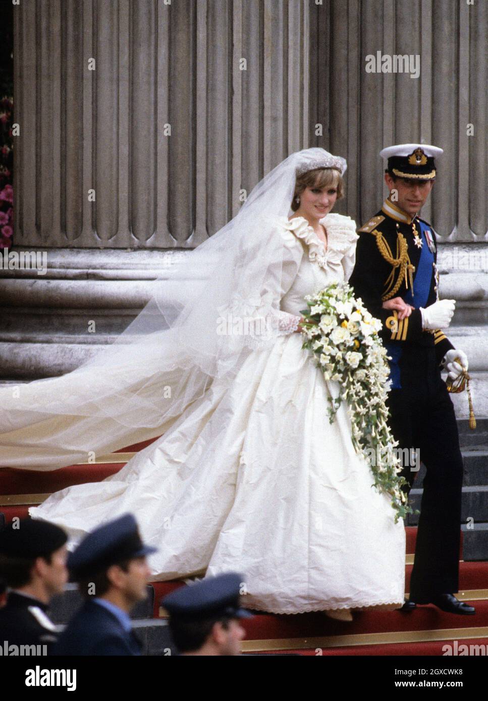 **FILE PHOTO** Diana, Princess of Wales, wearing an Emanuel wedding dress, and Prince Charles, Prince of Wales leave St. Paul's Cathedral following their wedding on 29 July 1981. Designers Elizabeth and David Emanuel are holding an auction of dresses worn by the late Princess Diana. The dresses are to go up for auction on June 8, 2010 in London, at specialist vintage fashion auctioneers Kerry Taylor Auctions.  Stock Photo