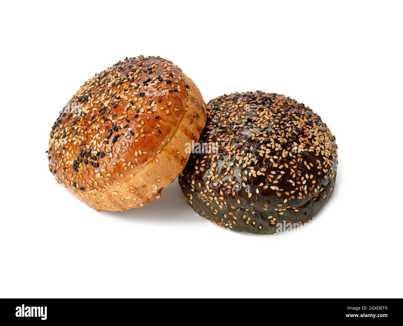two baked sesame seed buns isolated on white background, hamburger bread Stock Photo