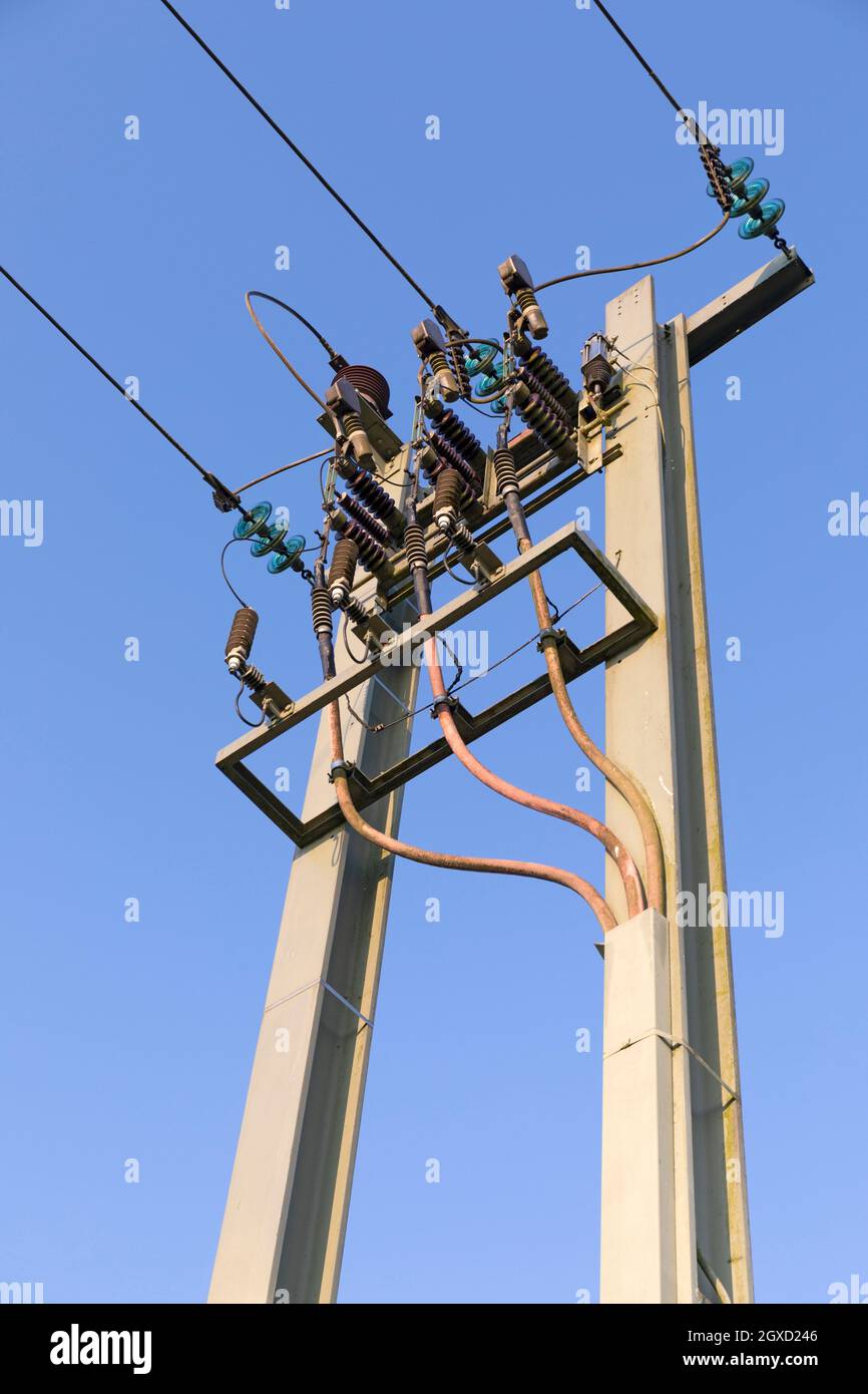 Europe, Luxembourg, Useldange, Low Voltage Electrical Supply where Above Ground Cables are terminated and directed Underground. Stock Photo