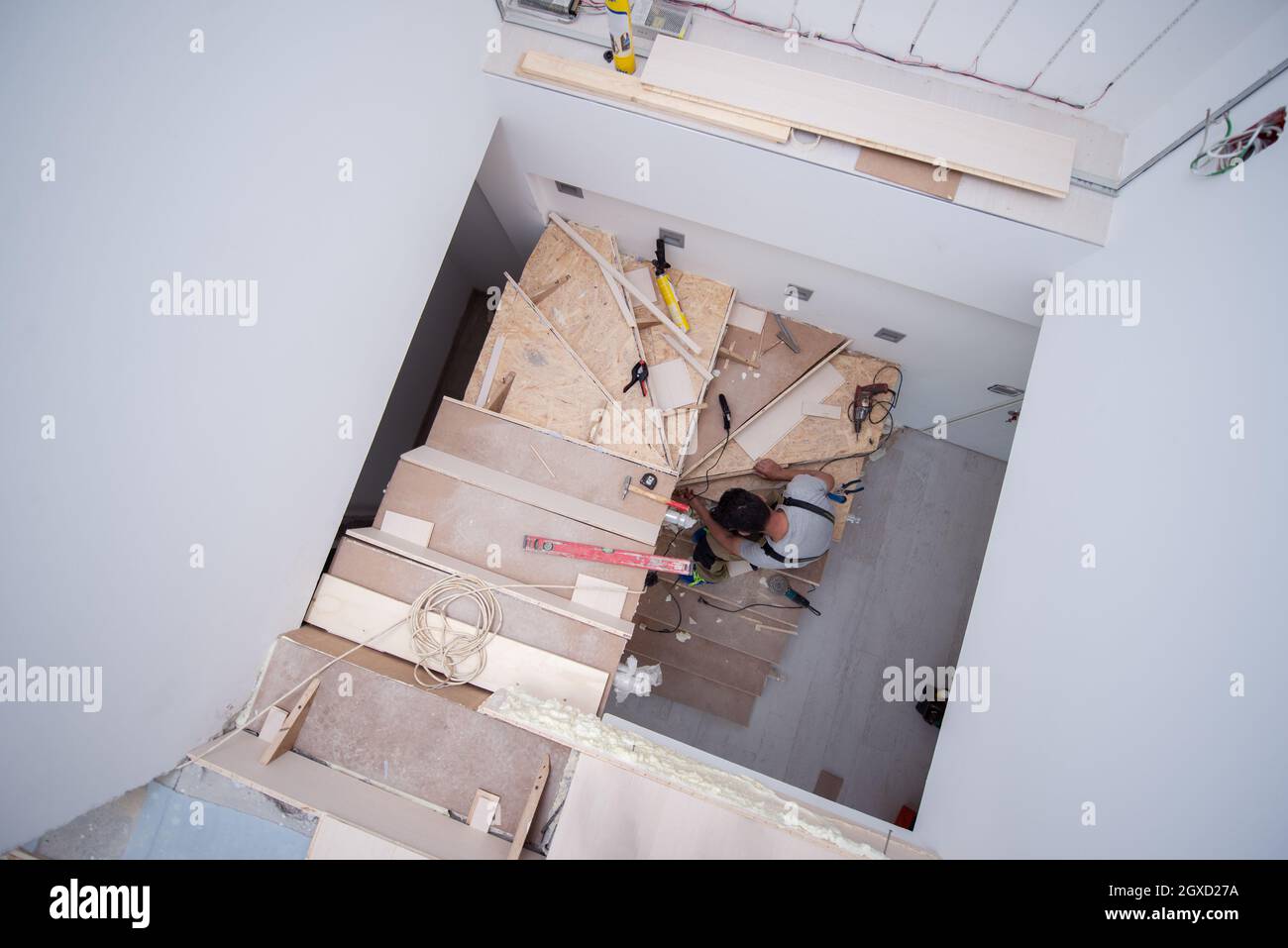 work in progress on stylish interior professional carpenter installing ...