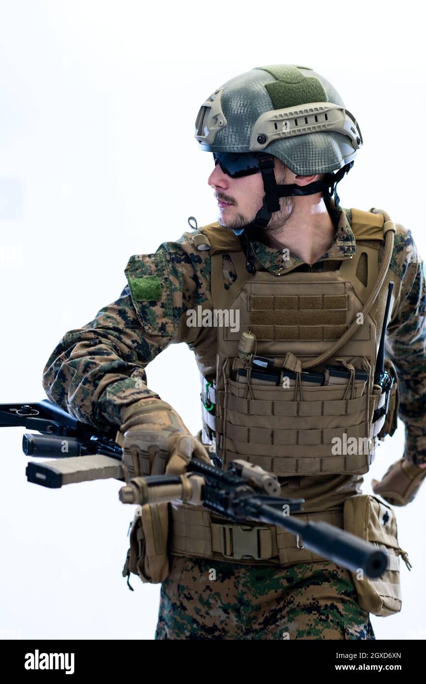 american marine corps special operations modern warfare soldier with fire  arm weapon and protective army tactical gear ready for battle Stock Photo -  Alamy
