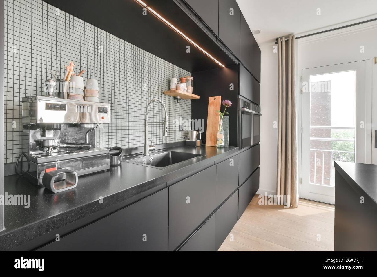 Modern coffee machine placed on dark 