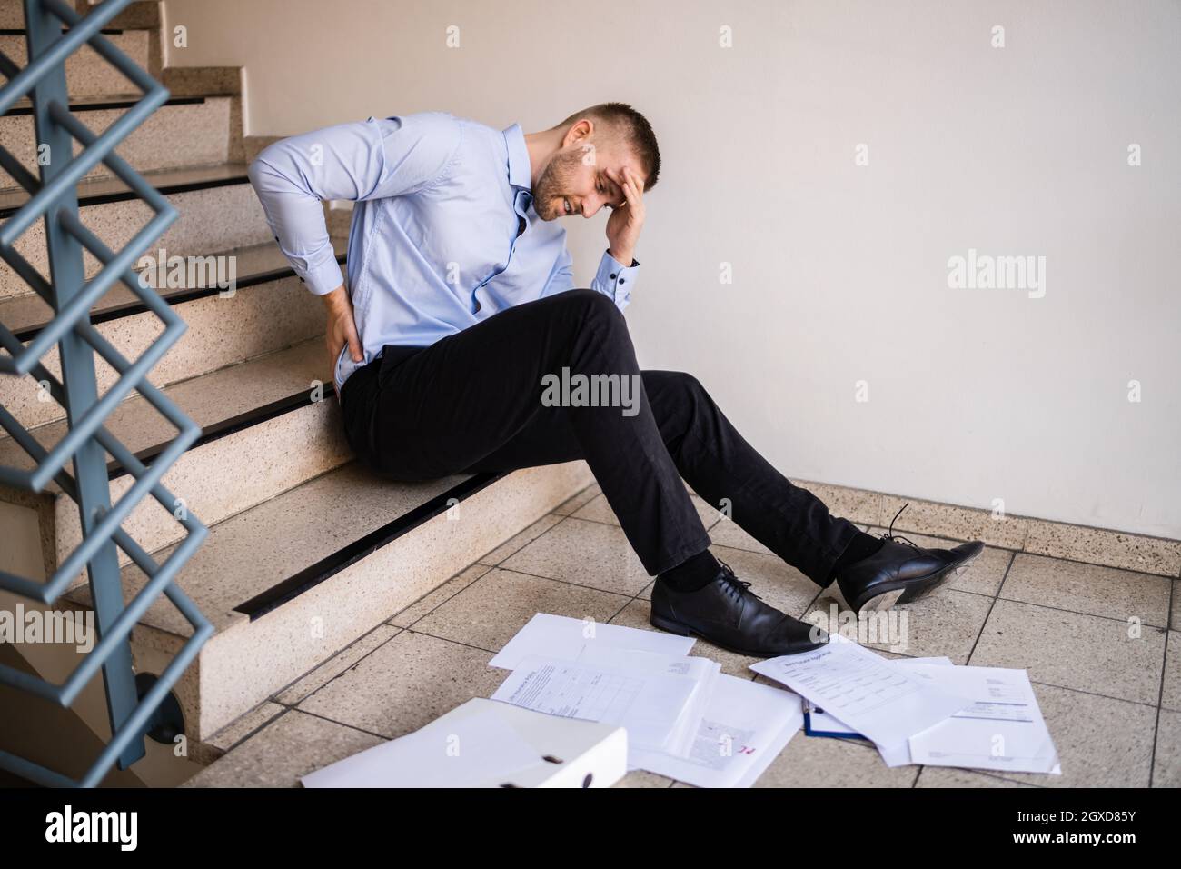 Fall And Fall Injury Accident At Workplace. Man Fell Down Stairs Stock Photo Alamy