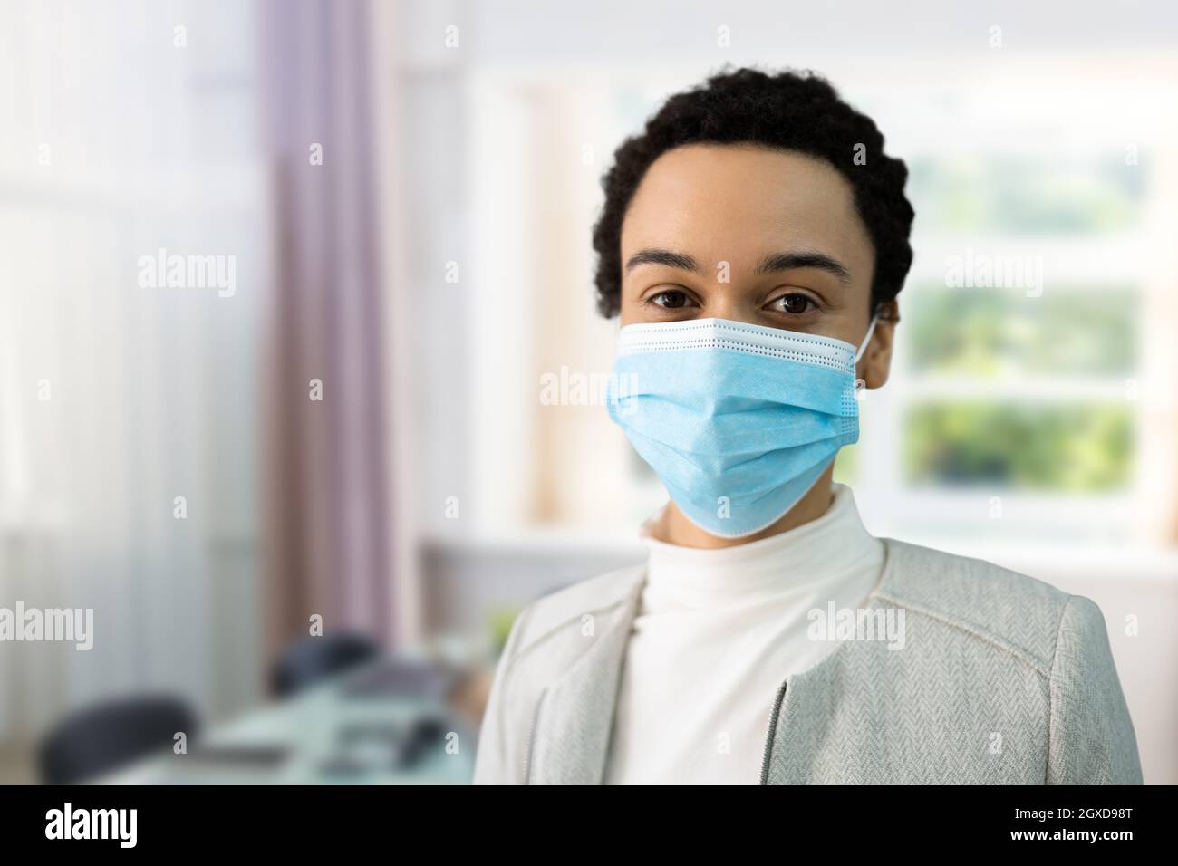 African American Woman Wearing Covid Medical Mask Stock Photo - Alamy