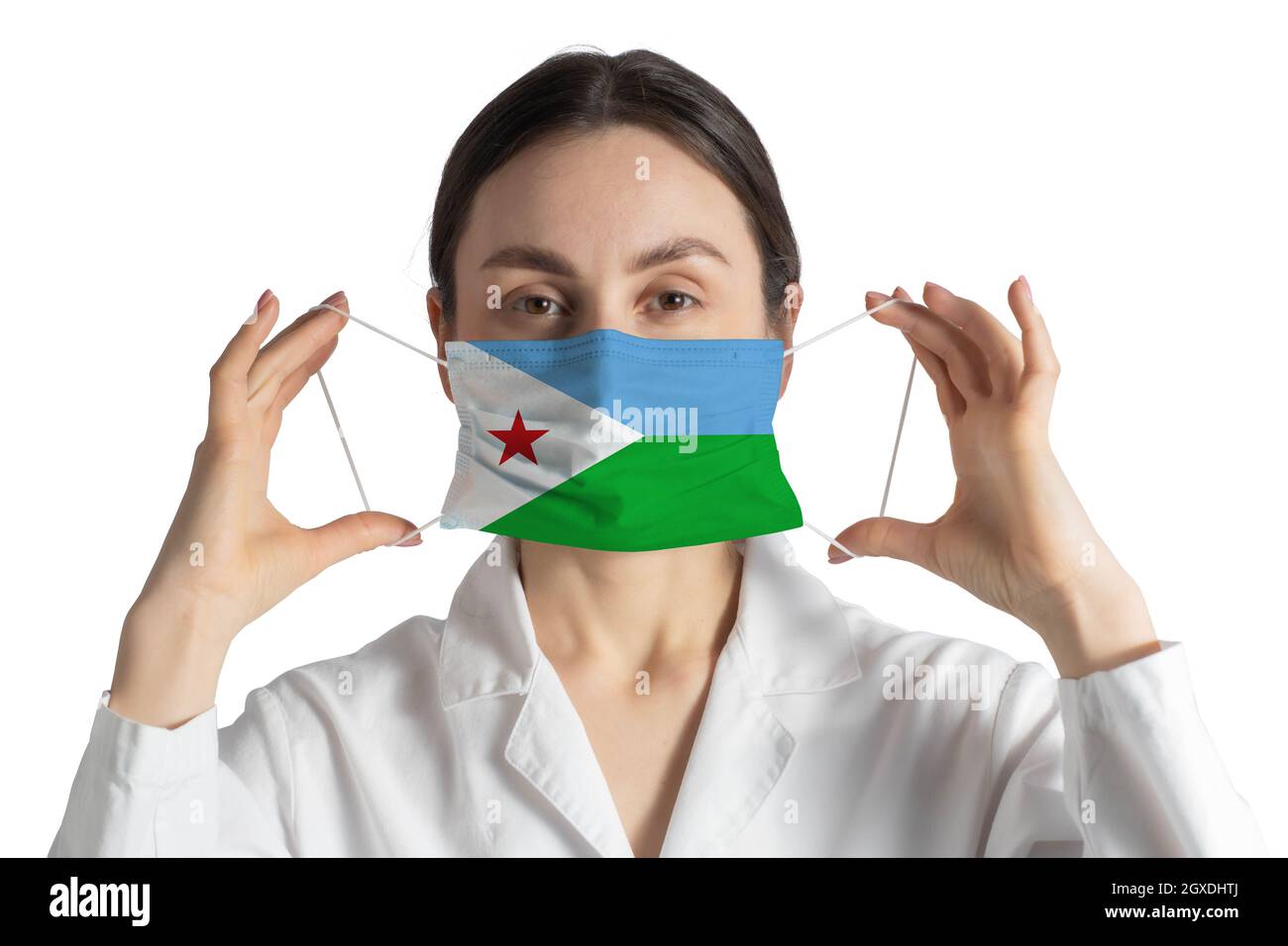 Respirator with flag of Djibouti Doctor puts on medical face mask isolated on white background. Stock Photo
