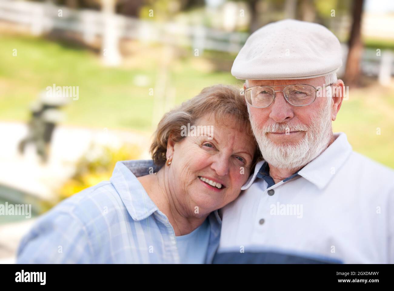 Happy Senior Couple Enjoying Each Other in The Park Stock Photo - Alamy