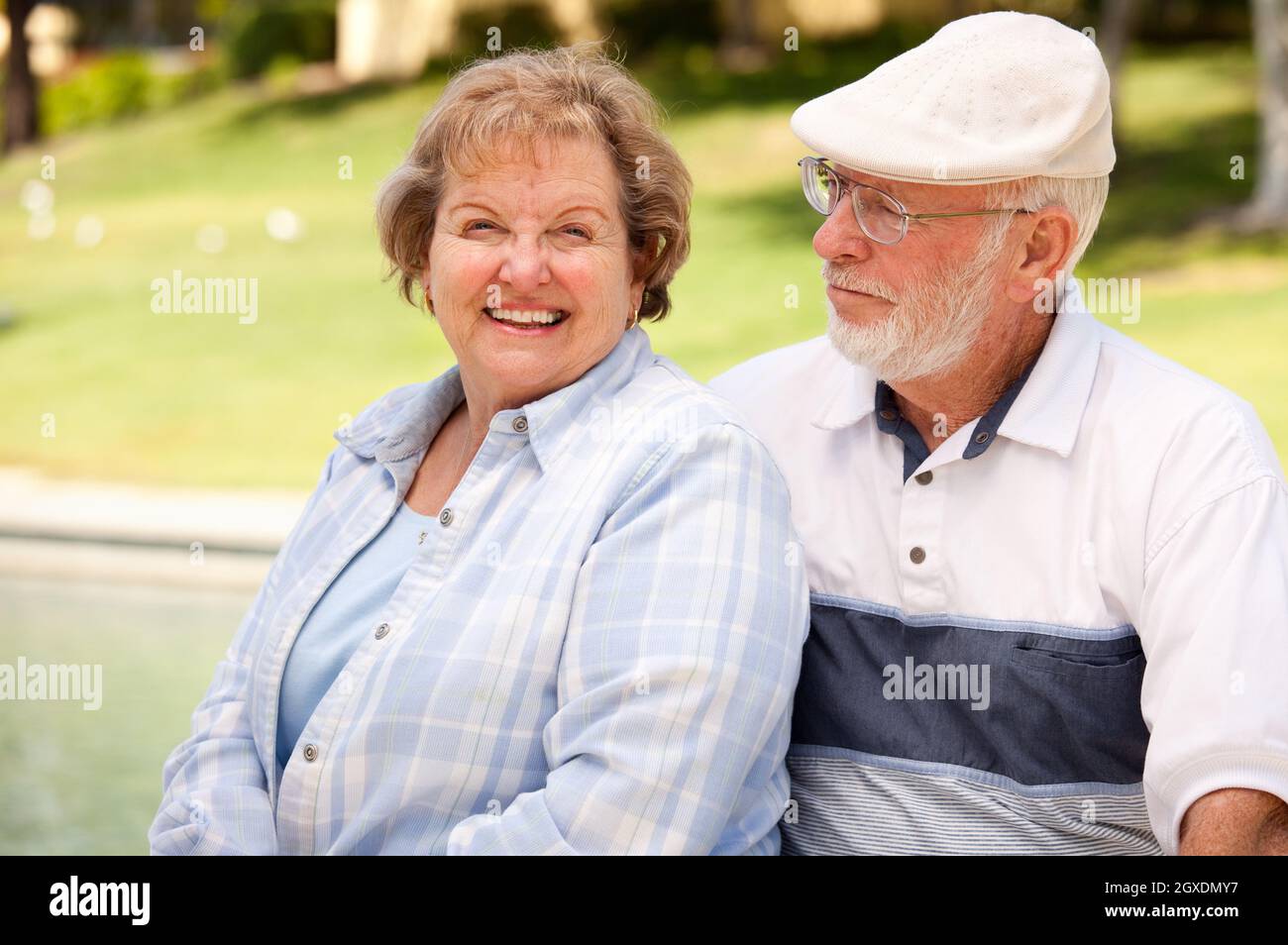 Happy Senior Couple Enjoying Each Other in The Park Stock Photo - Alamy