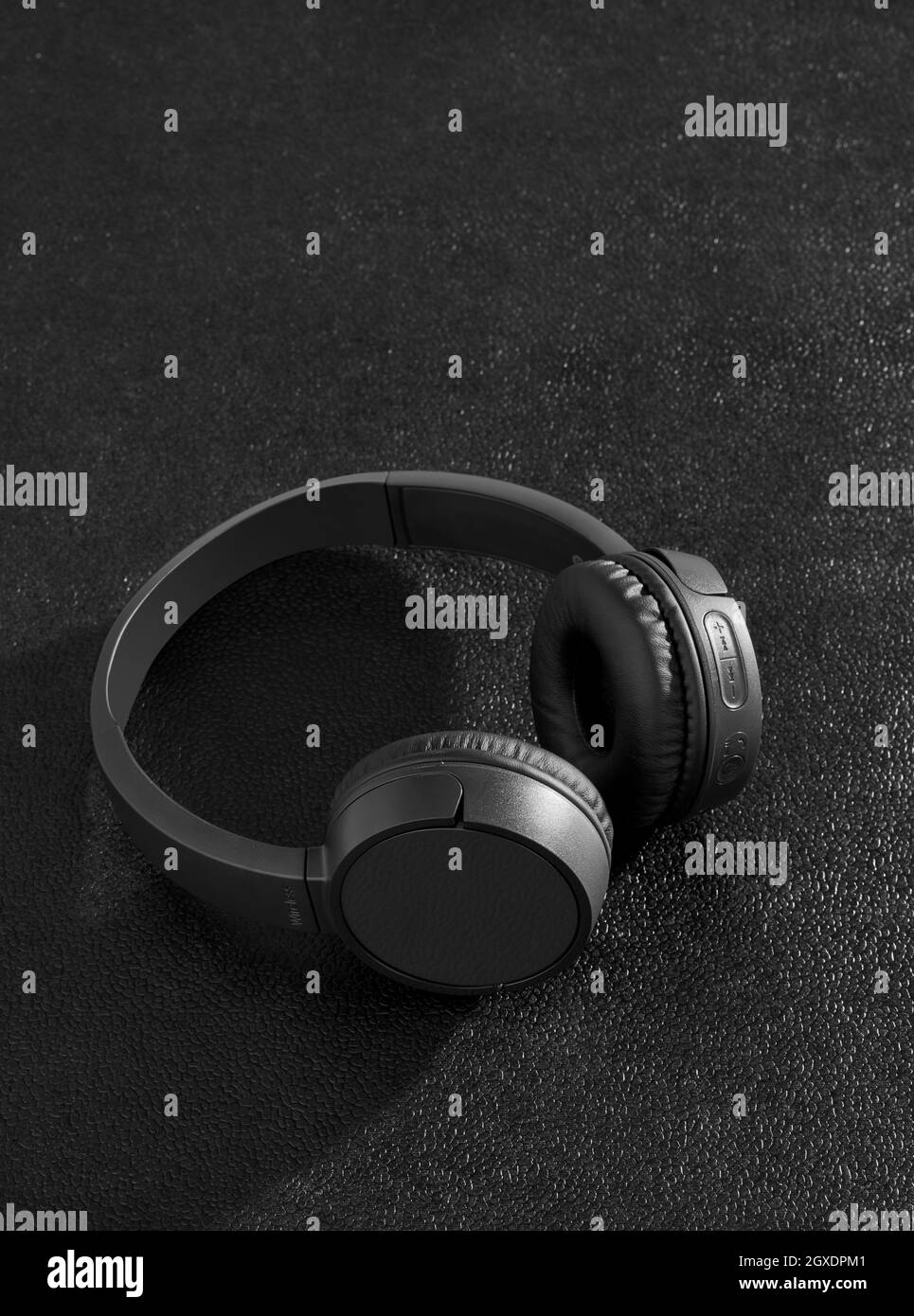 Black headphones on black Stock Photo Alamy