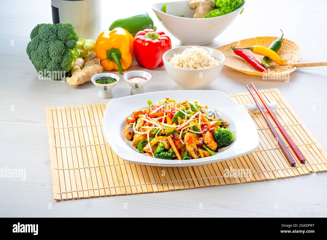 sweet and sour chicken with rice and vegetables Stock Photo Alamy