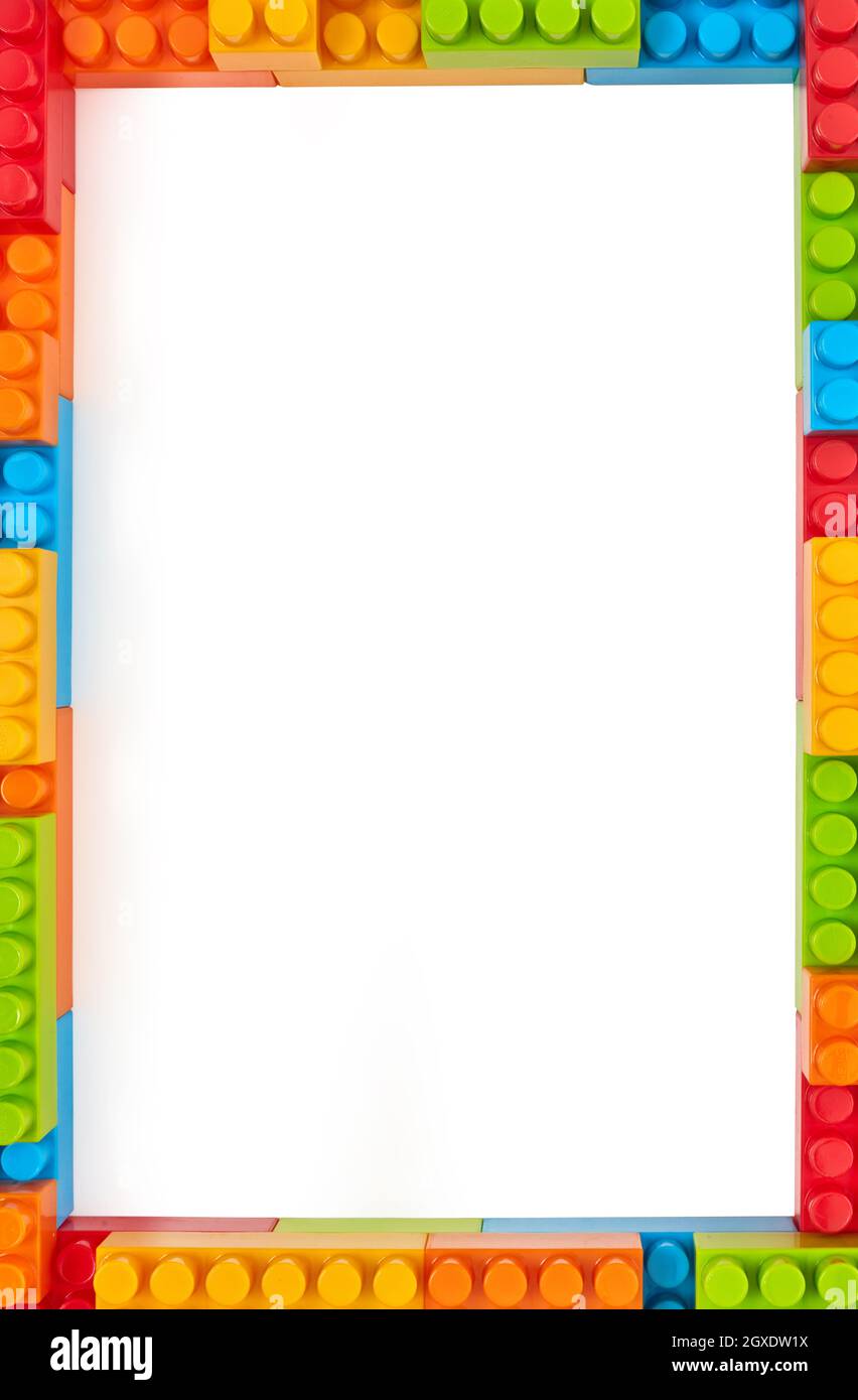 Plastic toy blocks on white background Stock Photo - Alamy