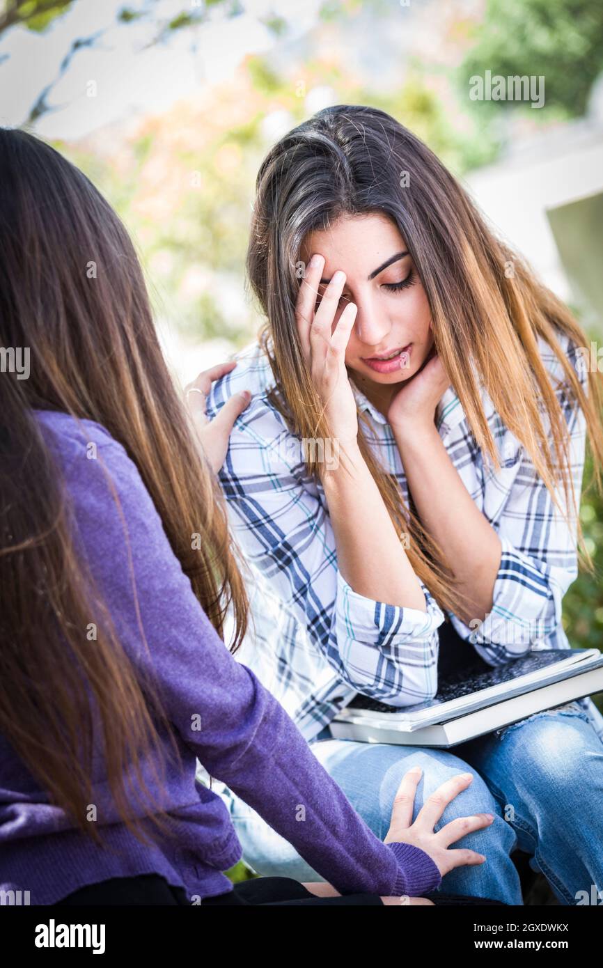 Sad girl crying friend comforting hi-res stock photography and images ...