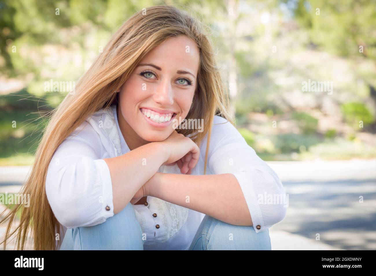 Portrait of a Beautiful Young Woman Outdoors at the Park Stock Photo ...