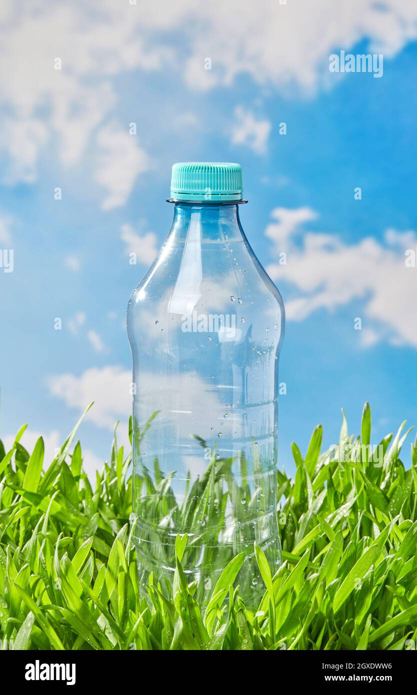 Water bottle in the grass Stock Photo - Alamy