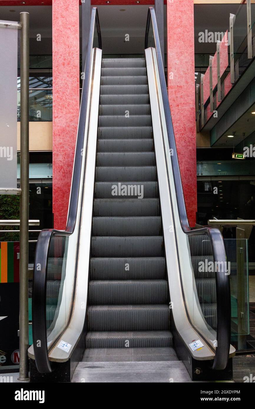Escalator in department store hi-res stock photography and images