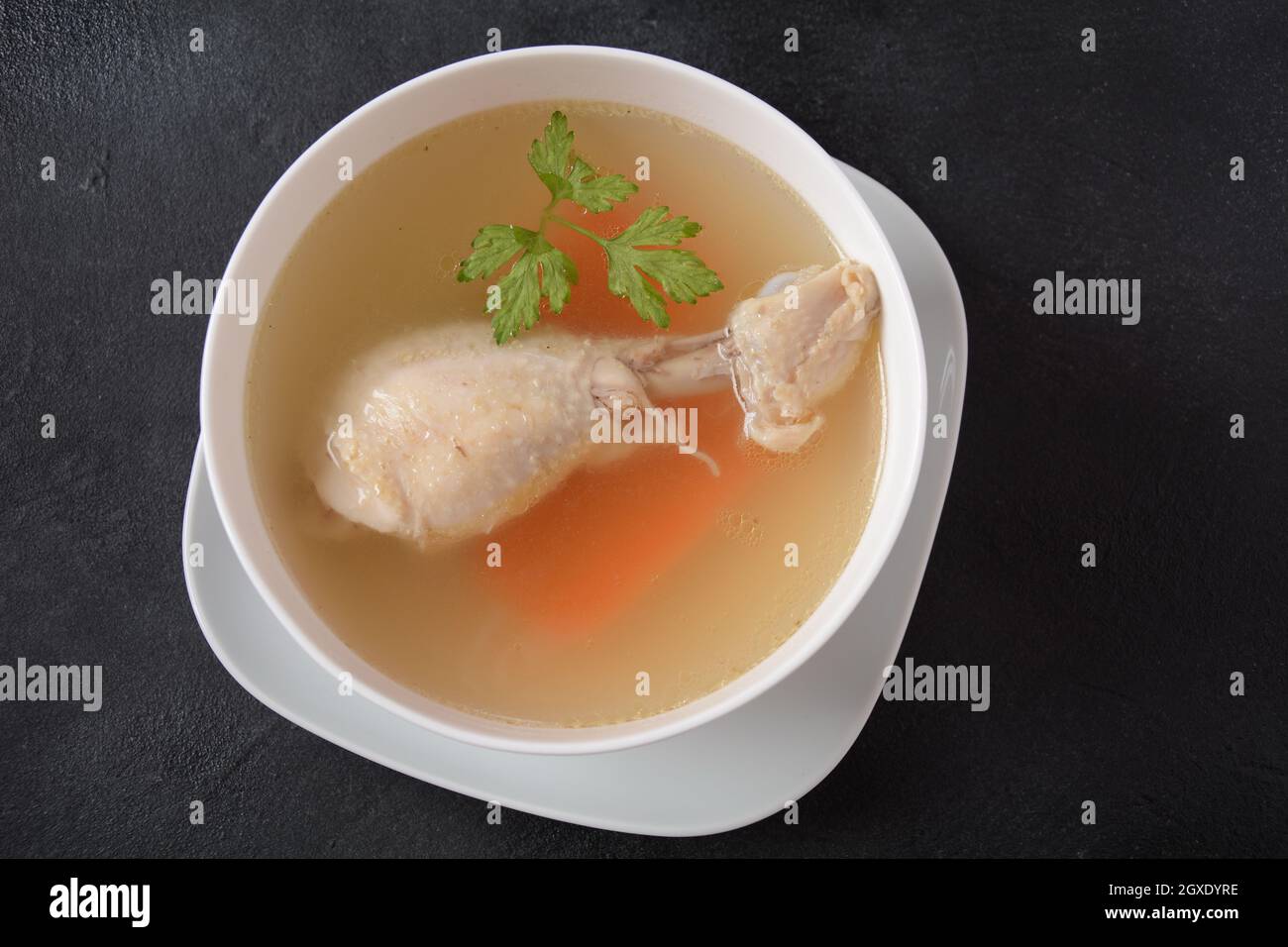 Chicken bouillon broth, boiled meat chicken leg Stock Photo Alamy