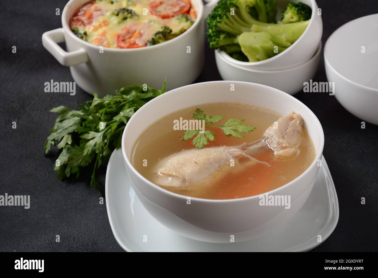 Chicken bouillon broth, boiled meat chicken leg Stock Photo Alamy