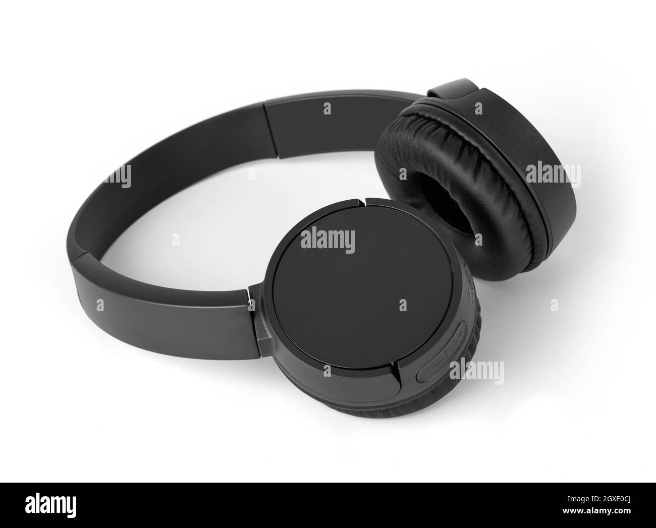Black headphones on white background Stock Photo - Alamy
